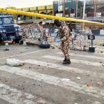 A soldier inspects the aftermath of Monday's bomb blast at a market in Maiduguri, Nigeria, Tuesday, March 17, 2026.